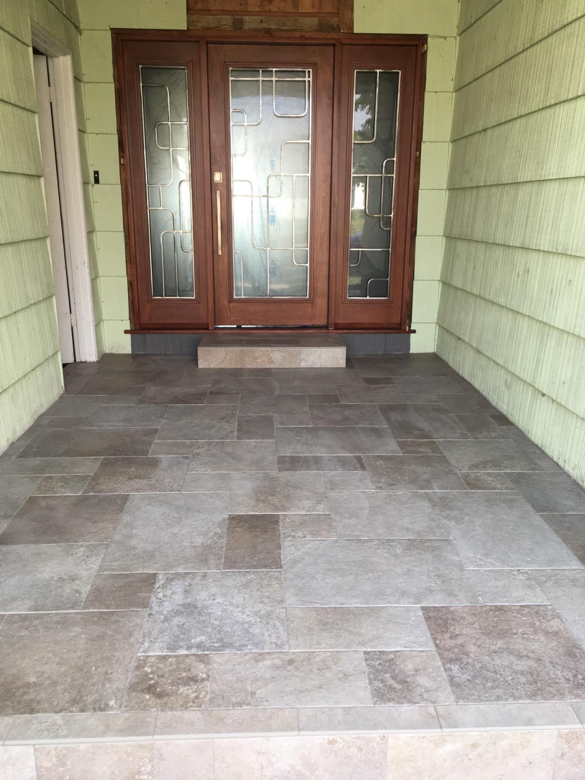 Front patio tiles in different size tile pattern